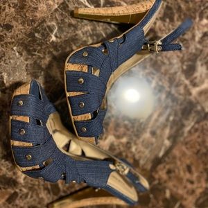 Andrea denim peep toe heels.